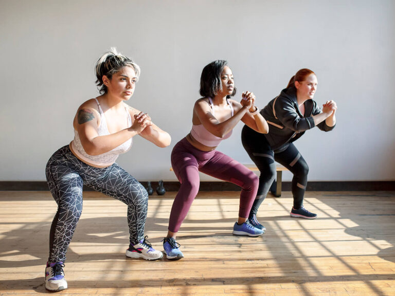 women-doing-squats-in-fitness-class-2025-02-10-10-07-59-utc (1)
